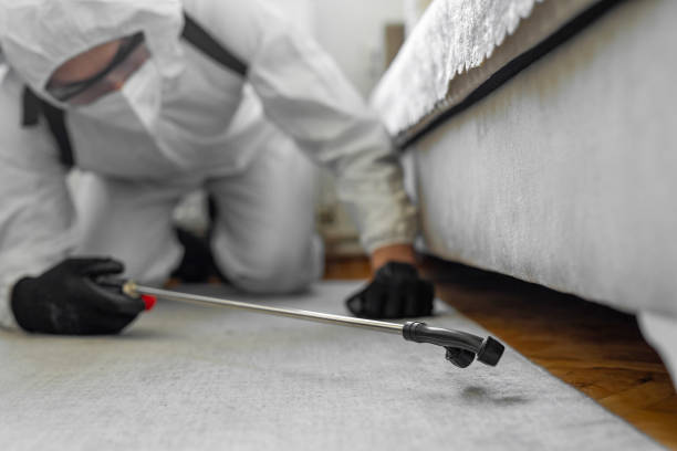 Professional Cockroach Control technician working in Liberty, IN